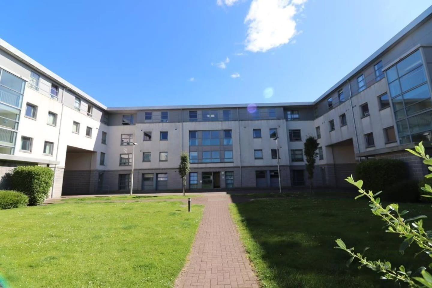 Merkland Lane flats with a lawn and path, Aberdeen